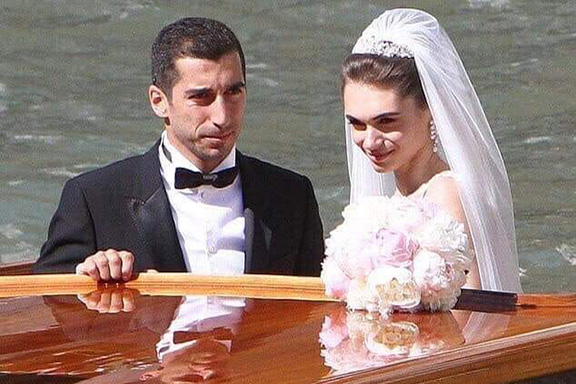 The newlyweds on a water taxi on the Venice canals