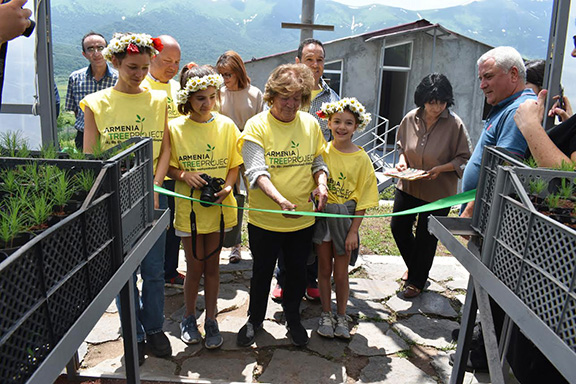 The late Charles G. Bilezikian’s wife Doreen officially opens the greenhouse in Margahovit Village on June 15