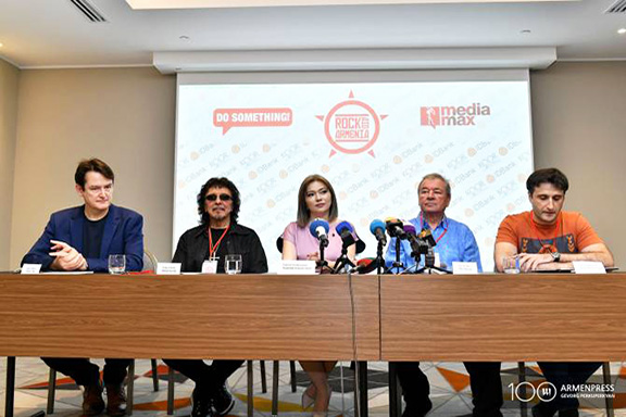 A scene from a press conference for Rock Aid Armenia's 30th Anniversary