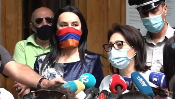 ARF Supreme Council of Armenia member Lilit Galstyan speaks to reporters on June 30