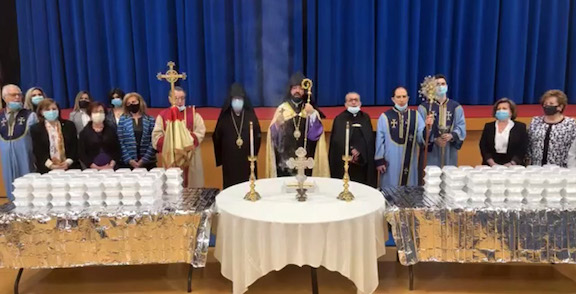 The Prelate blesses the "Madagh" after officiating requiem for ARS members