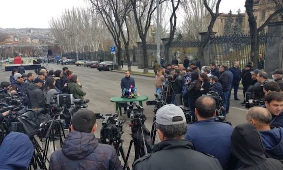 ARF leader and coordinator of the Homeland Salvation Movement Ishkhan Saghatelyan speaks to reporters on Baghramyan Avenue on March 19